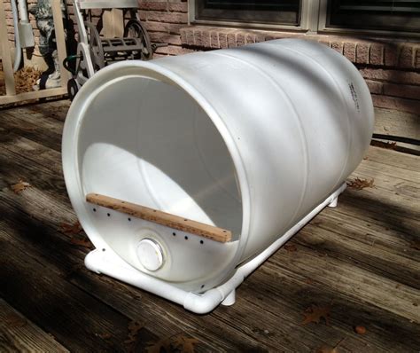 dog house from metal barell|homemade barrel dog house.